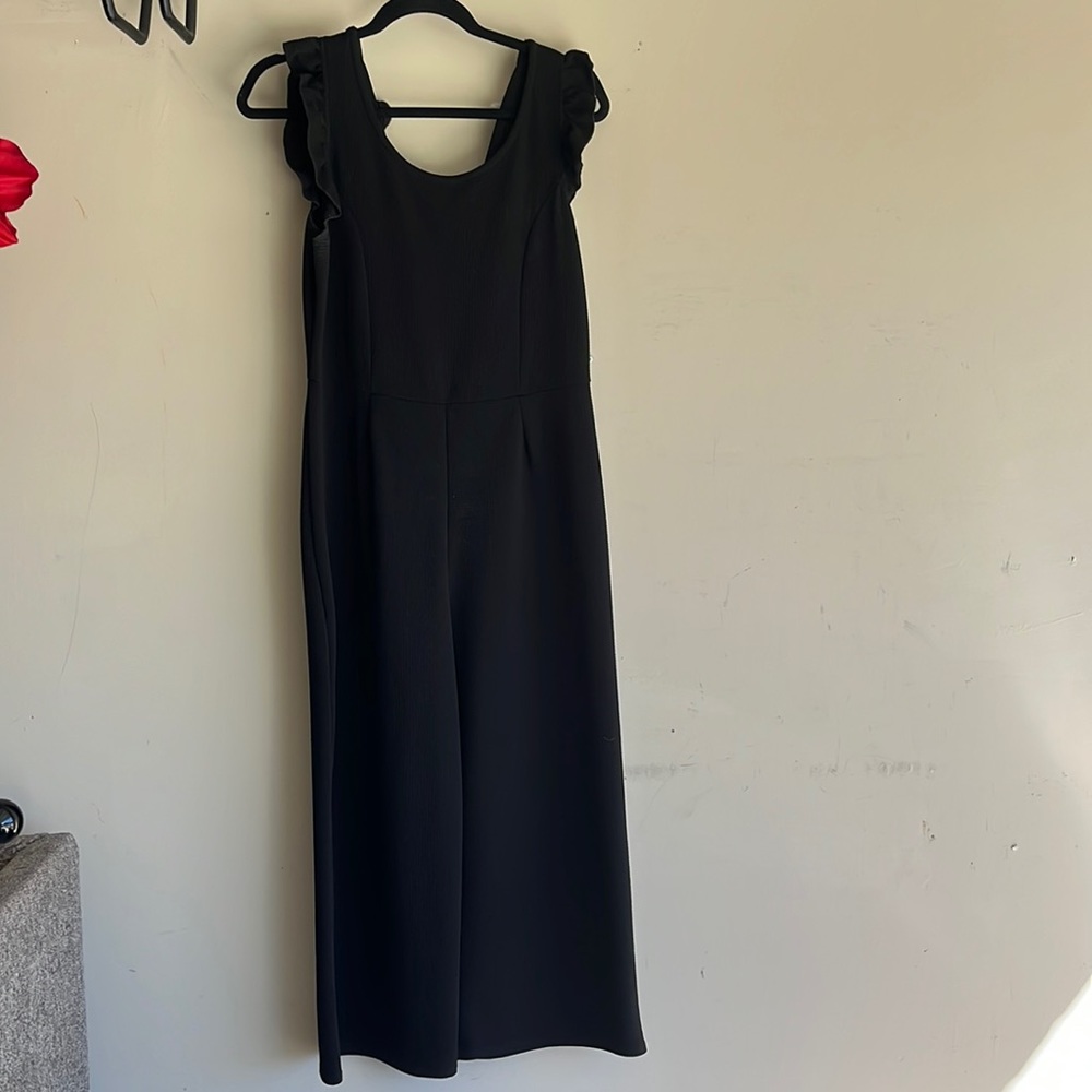 Black one piece with ruffled sleeves
